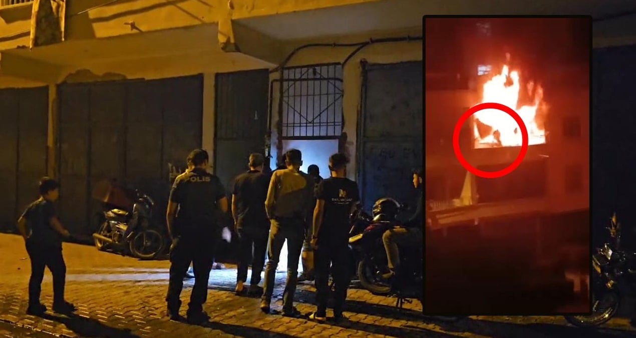 yanginda kalan cocugunu kurtarmak icin alevler arasina daldi NUknYdRb